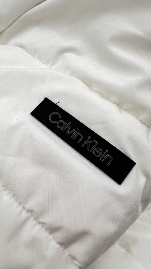 Piumino leggero cartellino