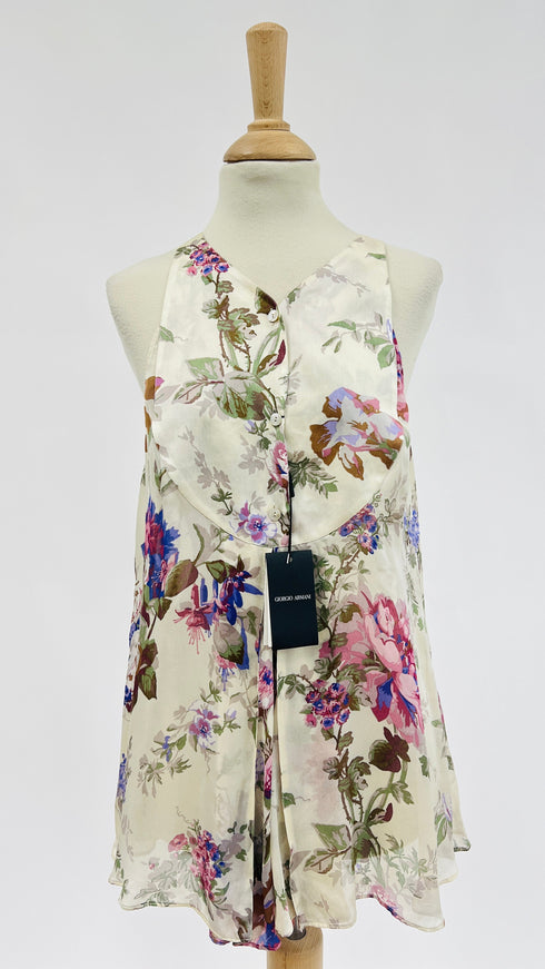 Top in seta a fiori con cartellino