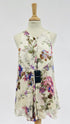 Top in seta a fiori con cartellino
