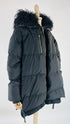 Piumino con cappuccio in pelliccia