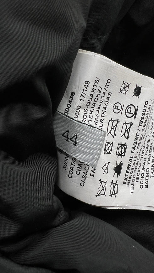 Piumino con cappuccio in pelliccia