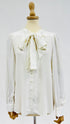 Camicia bianca a fiocco