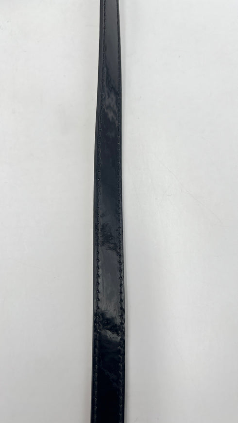 Cintura in vernice con cartellino