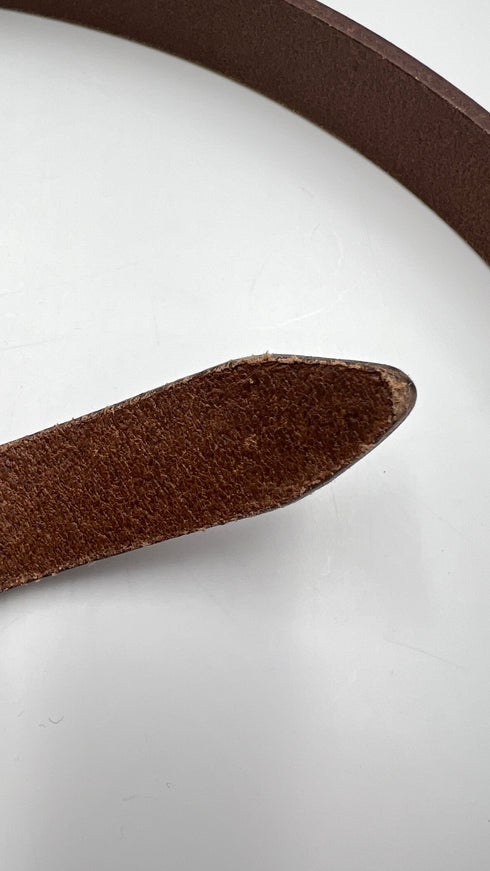 Cintura in cuoio con cartellino