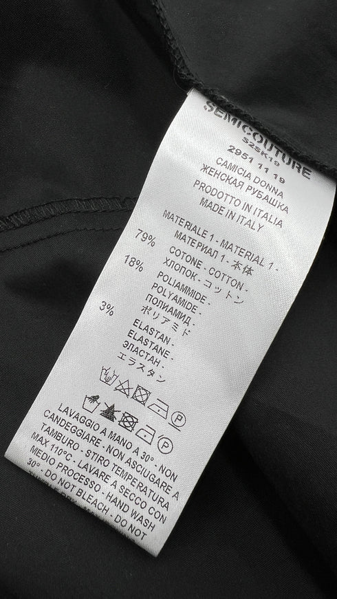 Camicia svasata con cartellino