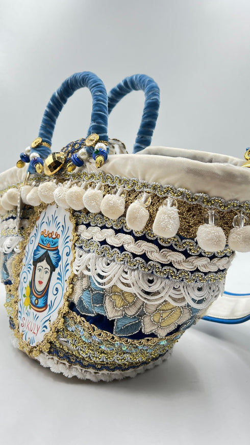 Borsa con passamanerie e perline