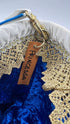 Borsa con passamanerie e perline