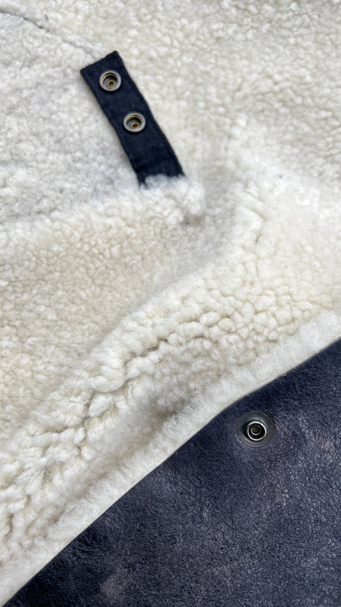 Gilet shearling asimmetrico