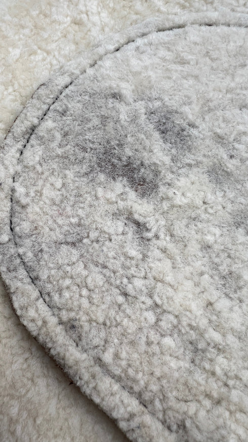 Gilet shearling asimmetrico