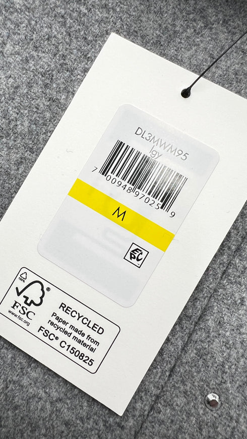 Cappotto con strass e cartellino