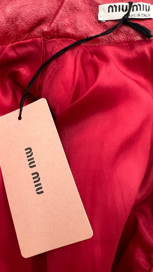 Abito corto smanicato in pelle