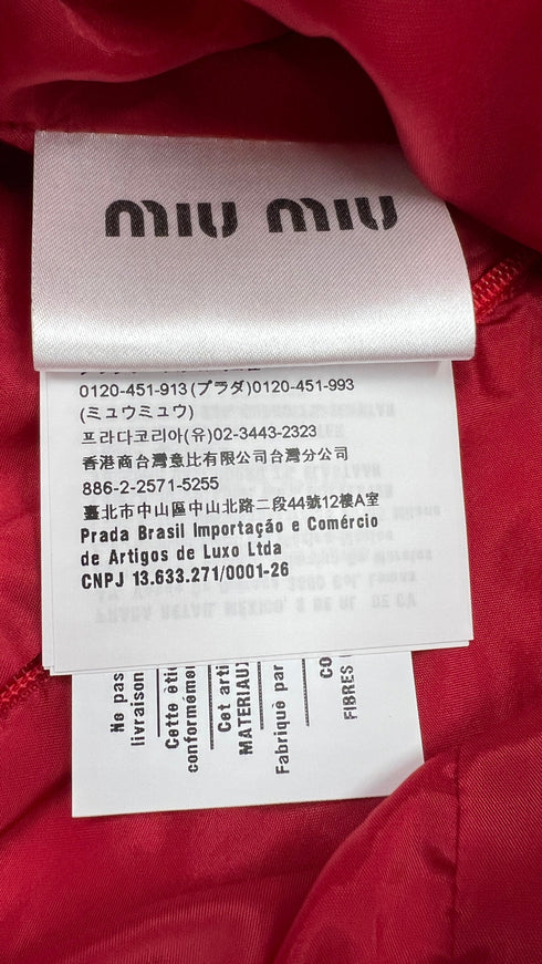 Abito corto smanicato in pelle