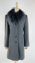 Cappotto con collo eco-pelliccia