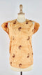 Top smanicato fantasia piume