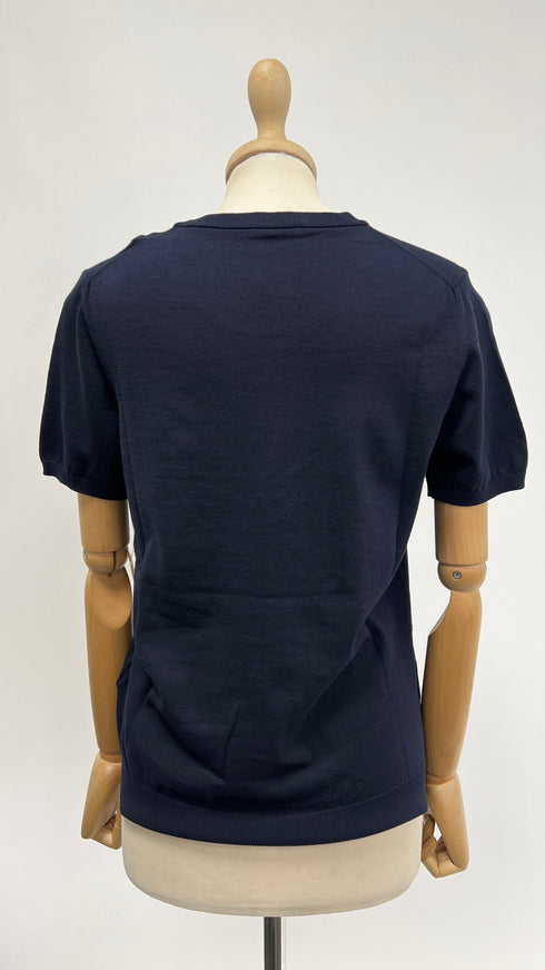 T-shirt blu con cartellino