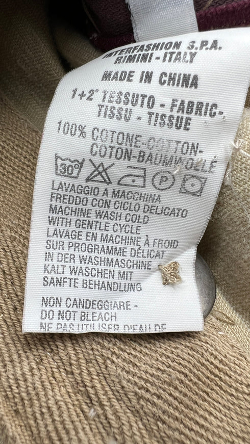 Giacca abbottonatura asimmetrica