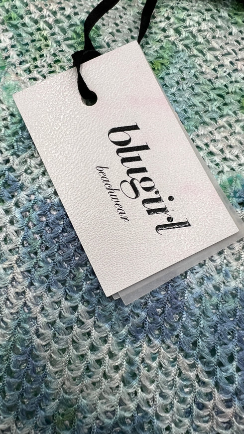 Copricostume traforato con cartellino