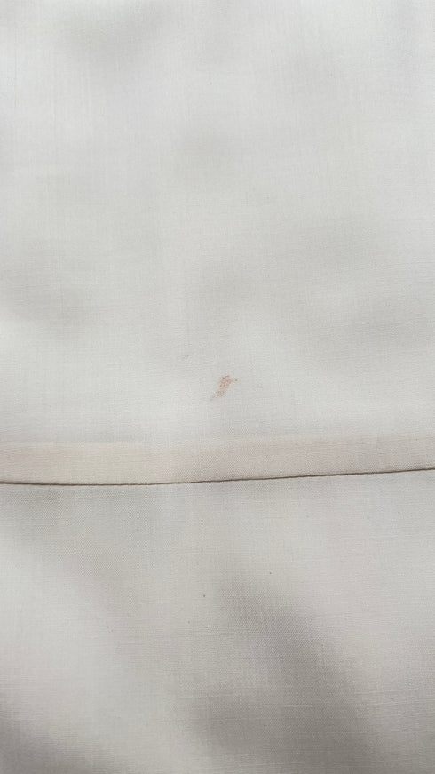 Abito a pannelli con cartellino