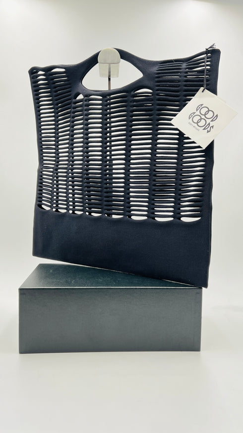 Tote traforata con cartellino