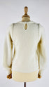 Maglia girocollo con trecce
