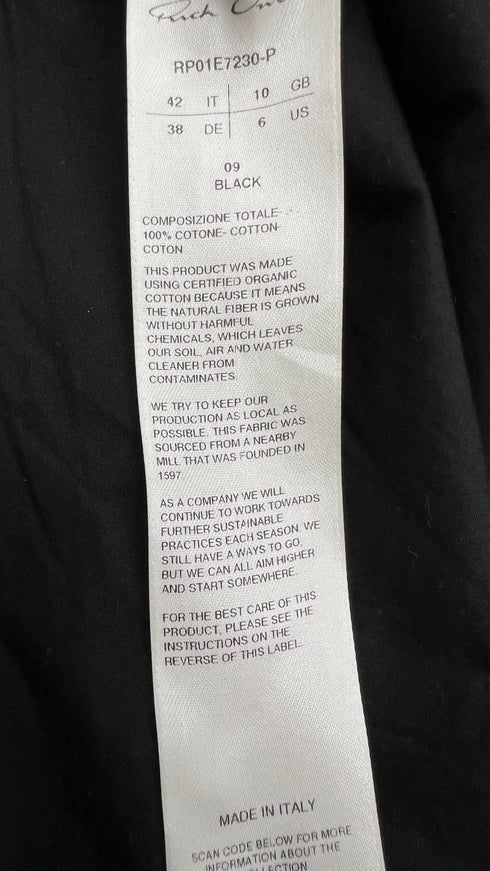 T-shirt over con cartellino