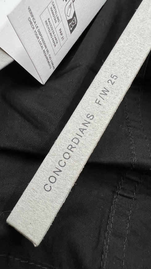 T-shirt over con cartellino
