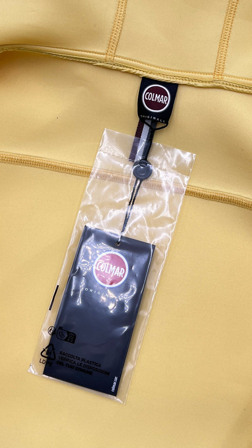 Giacca in neoprene con cartellino