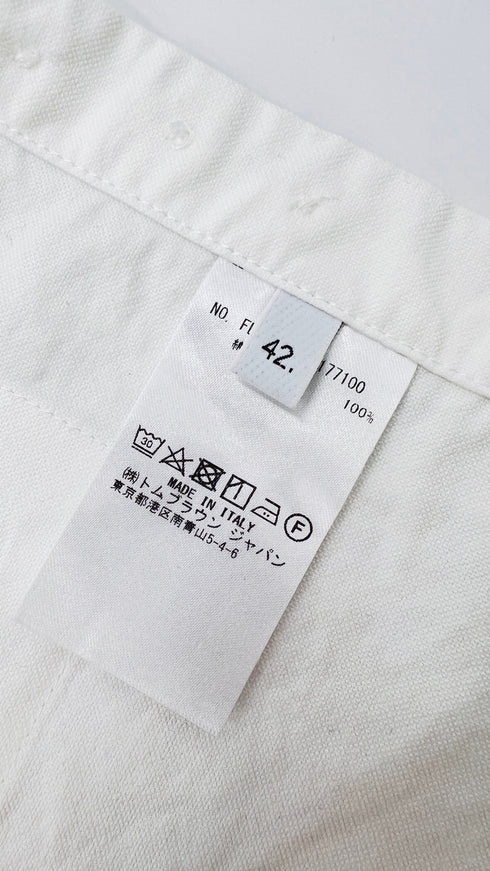 Camicia button-down con cartellino