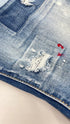 Jeans con patch a fiori