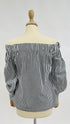 Blusa scollo a barca