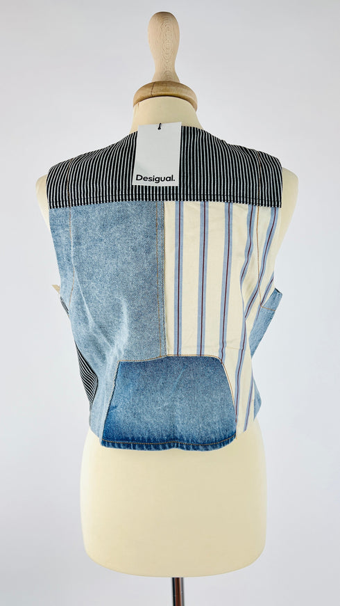 Gilet in denim con cartellino