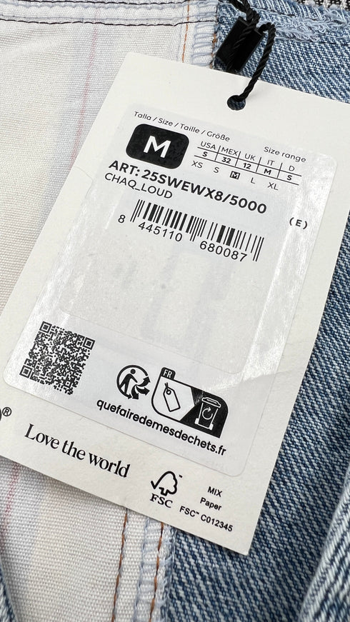 Gilet in denim con cartellino