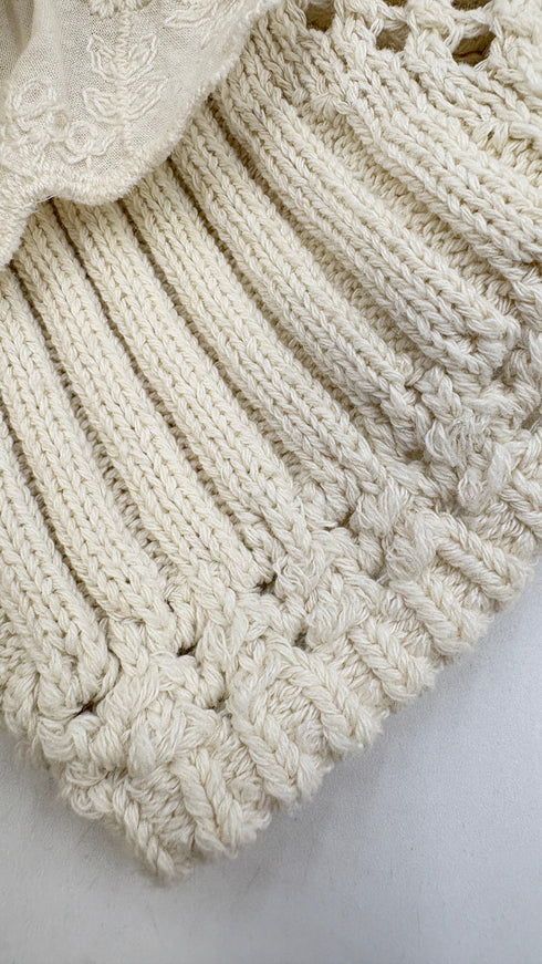 Top in maglia con rouche