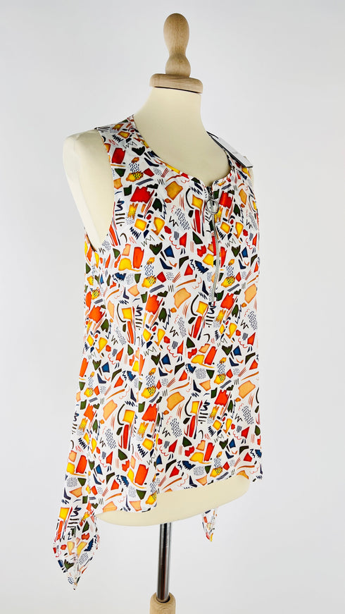 Top con zip e cartellino