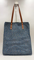Tote-bag animalier azzurra con cartellino