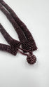 Collana in microperle bordeaux intrecciate