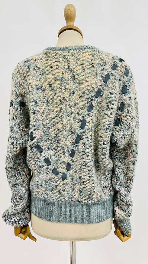 Maglione con intreccio in pelle