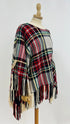 Poncho tartan con frange