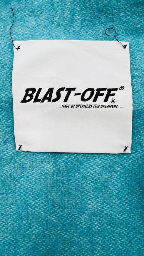 Poncho oversized con frange