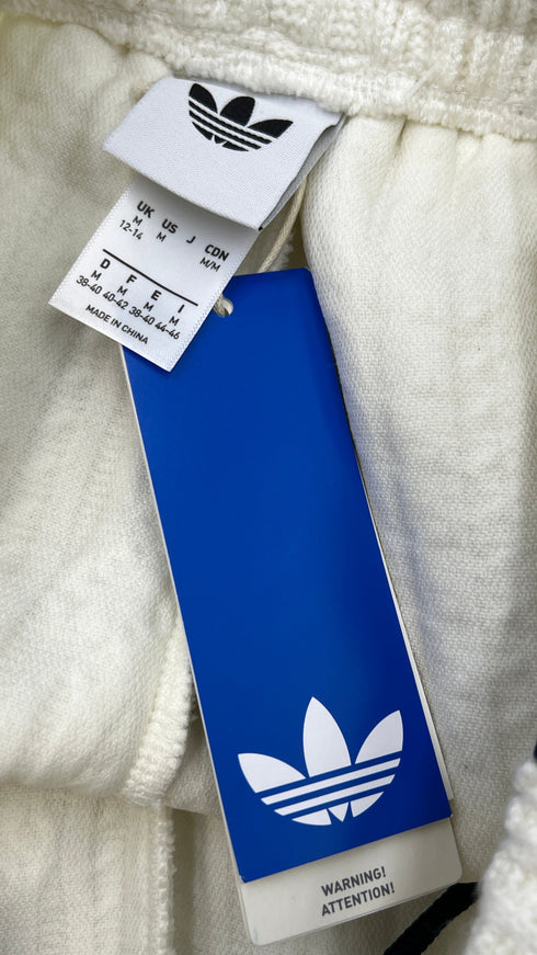 Pantaloni joggers con cartellino