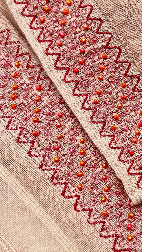 Cardigan con perline