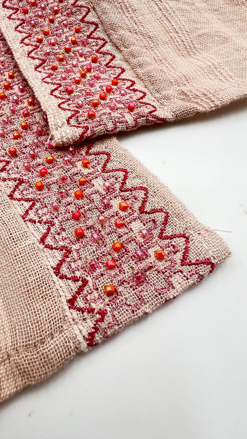 Cardigan con perline