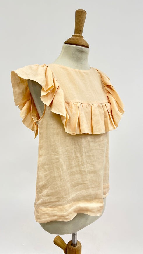 Top smanicato con volant