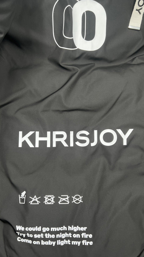 Piumino "Iconic" con cartellino