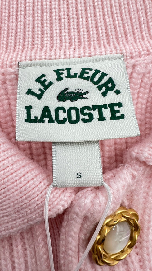 Polo in maglia con cartellino