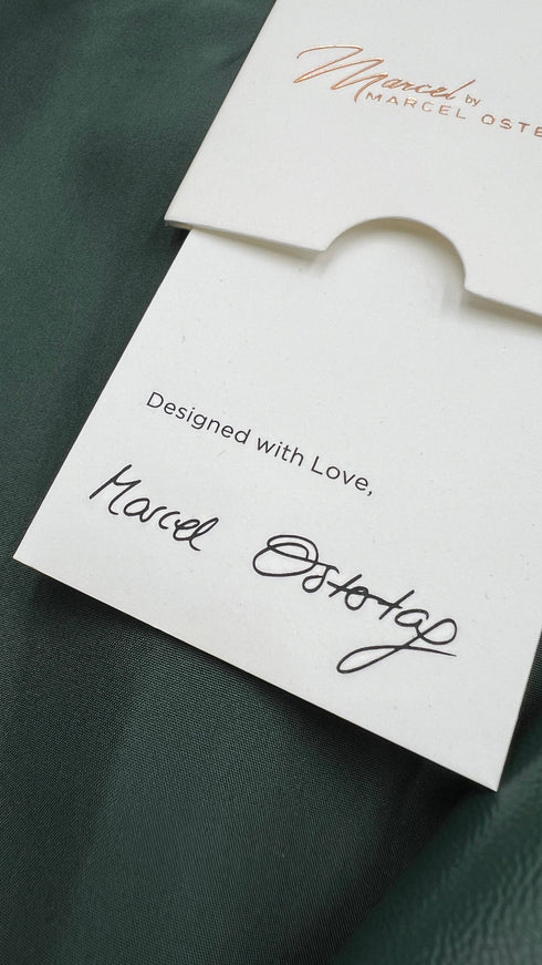 Giacca in vernice con cartellino