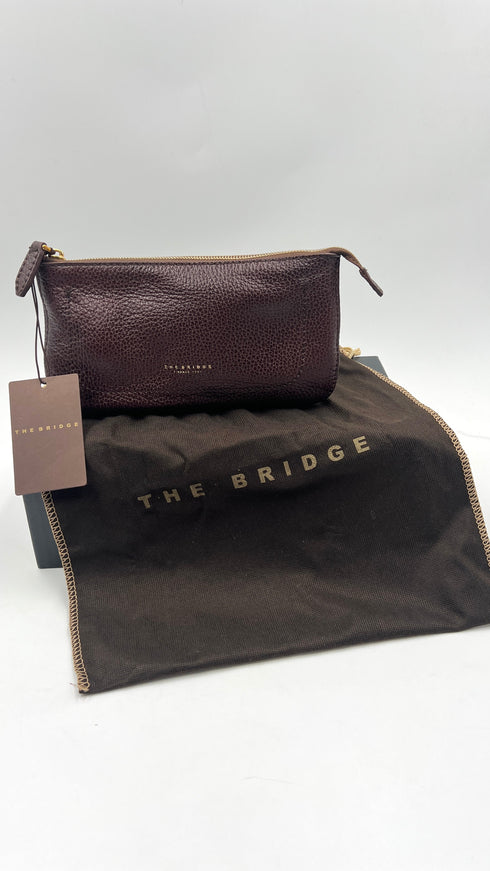 Pochette in pelle con cartellino