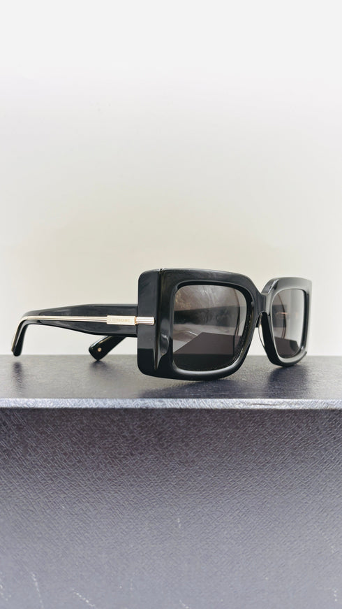 Occhiali da sole squadrati