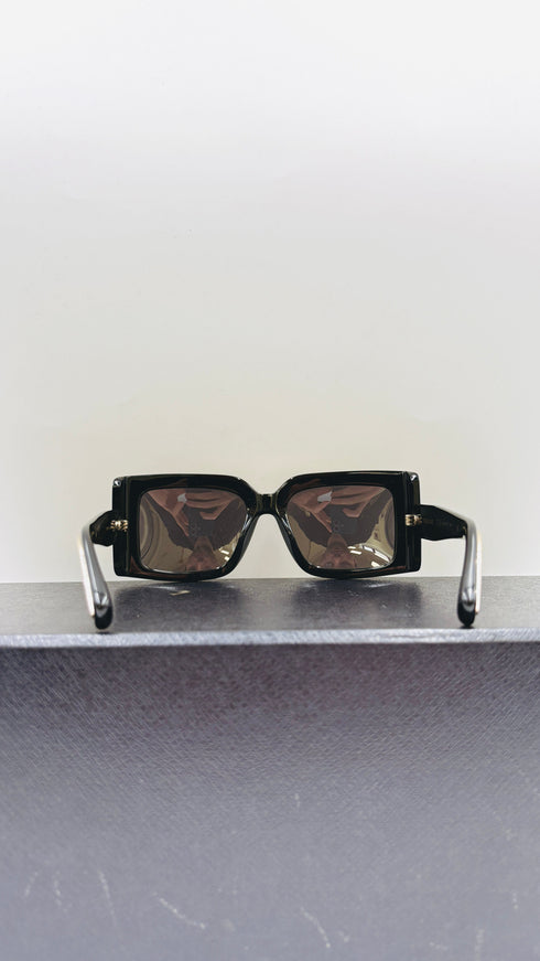 Occhiali da sole squadrati