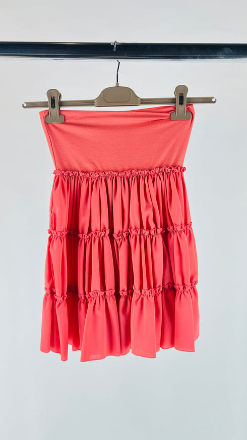 Gonna corta con balze